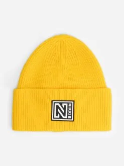 NIKKIE BADGE BEANIE Warm Yellow