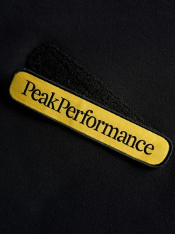 PeakPerformance PEAK PERFORMANCE SEASONAL PATCH HOOD MEN Black -Snow Kleding Verkoopwinkel schermafbeelding 2021 10 09 om 16.13.15